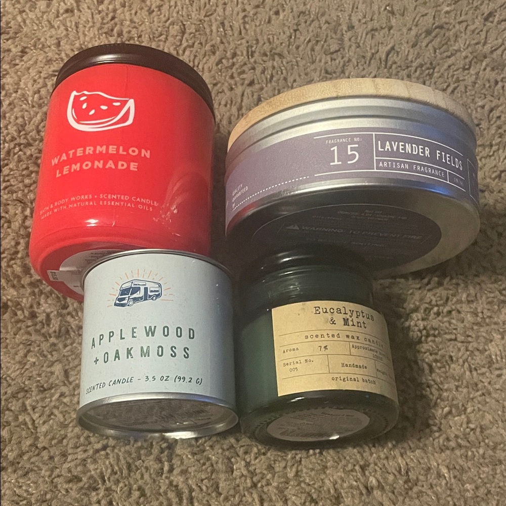 Set of Scented Candles in Red, Blue, Green, and Cream